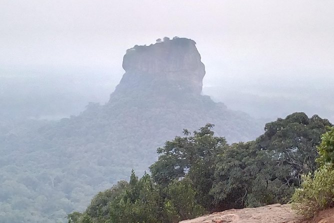 All inclusive Private day trip Sigiriya and Dambulla caves with more - Dambulla’s caves after the climb