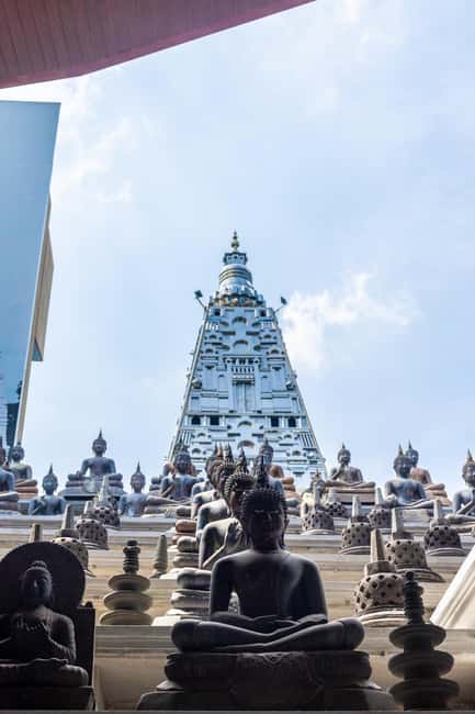 Colombo: private city tour from Negombo with hotel transfers - Gangaramaya Temple and a local Buddhist custom