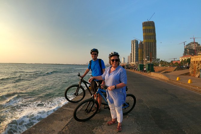 Luxury Night Cycle Tour of Colombo - The lighthouse, hotel, and a small royal prison